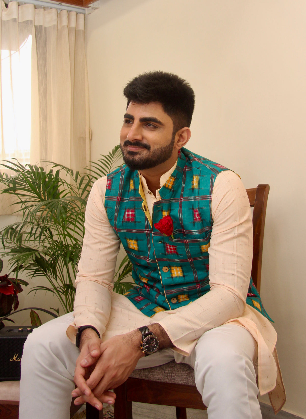Kacchi Keri reversible handloom jacket for men, teal ikat side, seated front view