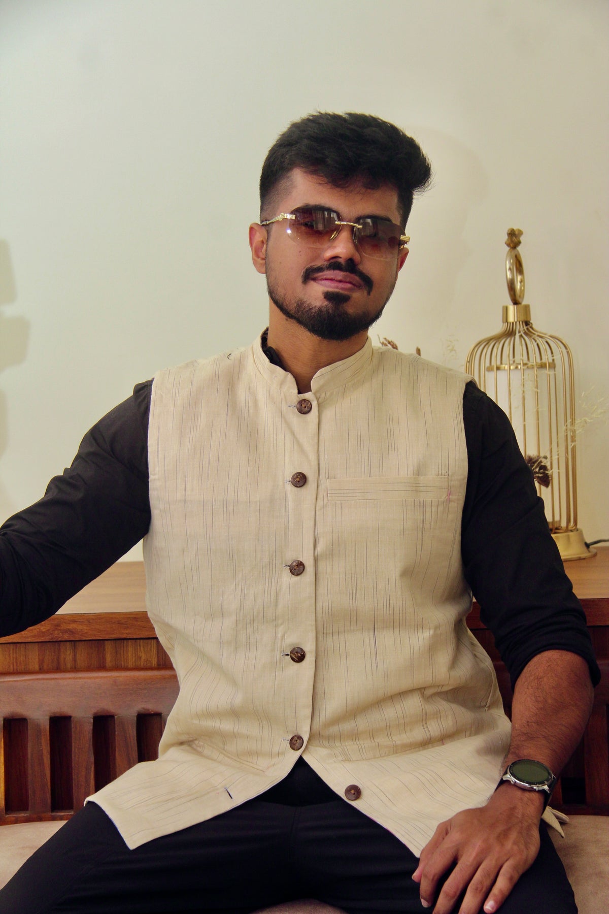 Sagar Kinaare reversible handloom jacket for men, cream reverse side, seated front view