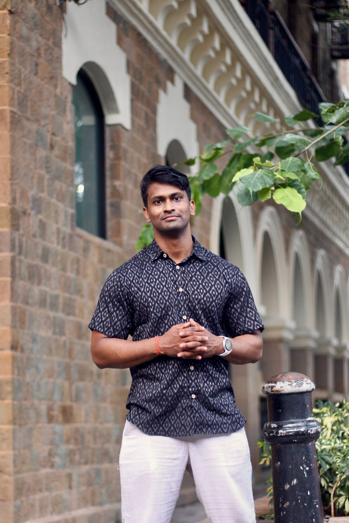 Nishith navy Nuapatna ikat handloom shirt for men, standing front view