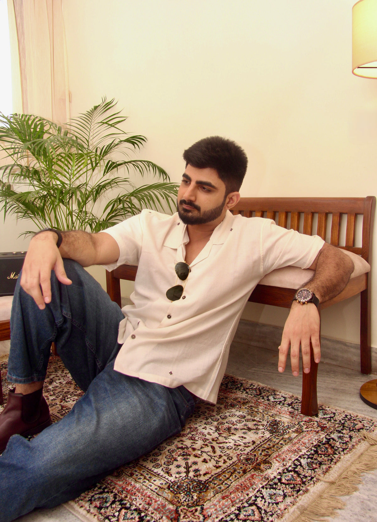 Shwet off-white Kotpad handloom shirt for men, seated view showing the button placket