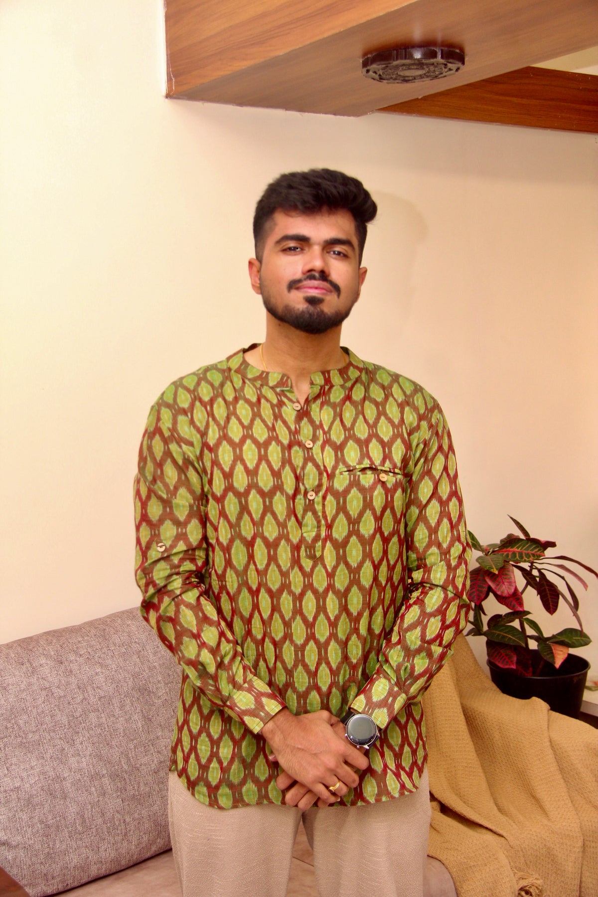 Aam Panna olive green Sambalpuri ikat handloom kurta for men, standing front view