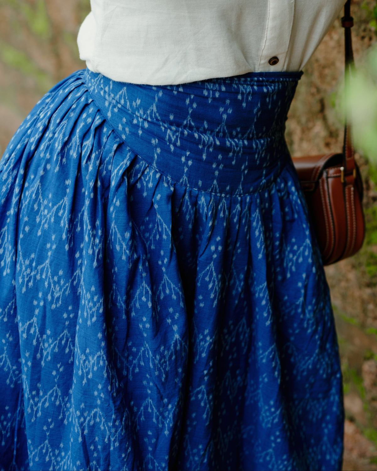 Avani blue Nuapatna handloom corset skirt, close view of the corset waistband and gathers